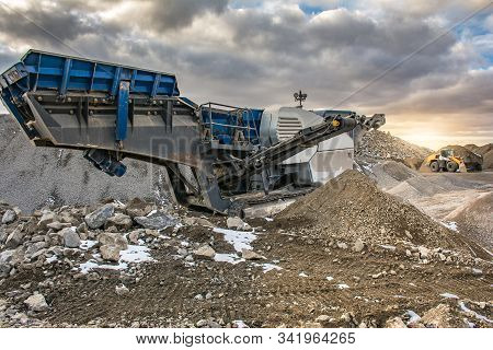 Stone Crusher In A Stone Extraction Mine. Heavy Machinery To Process Stone