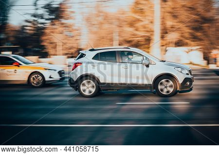 Suv Car In Motion. Silver Opel Mokka Model Is Driving On City Highway, Side View. Moscow, Russia - O