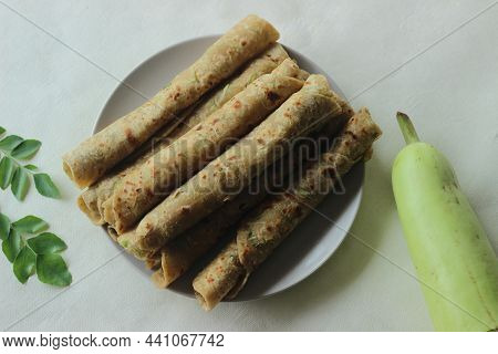Indian Flat Bread Made Of Whole Wheat Flour, Grated Bottle Guard, Yogurt And Spices. Commonly Called