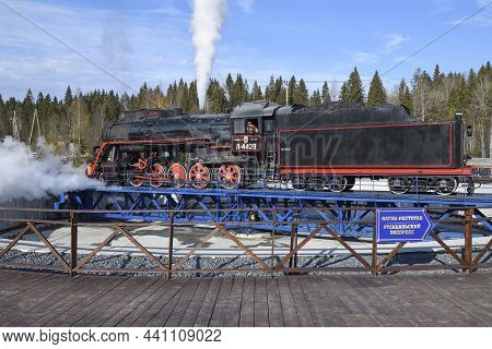 Ruskeala, Russia - October 07, 2021: Soviet Cargo Steam Locomotive L-4429 Turns Around On A Turntabl