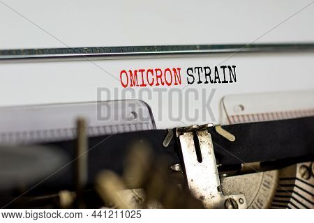 Covid-19 New Omicron Virus Variant Symbol. Concept Words Omicron Strain Typed On Retro Typewriter. M
