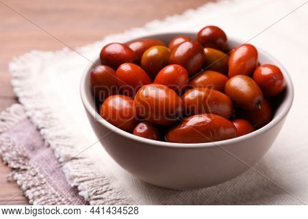 Fresh Ziziphus Jujuba Fruits In Bowl On Table, Closeup