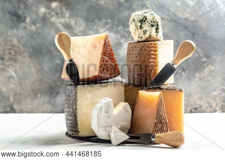 Petit Basque, French Cheese, Cheese Board Of Various Types Of Soft And Hard Cheese. Spanish Manchego