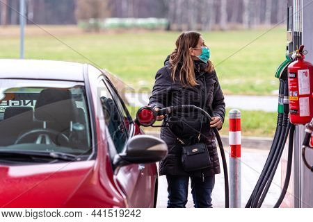 Riga, Latvia, January 2, 2021: The Driver Is Refueling At The Circle K Petrol Station