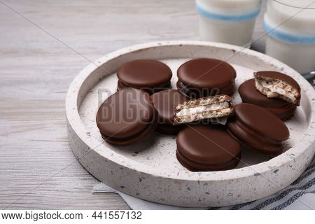 Tasty Choco Pies On White Wooden Table