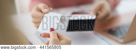 Female Hand Give Blank Calling Card Visitor. White Collar Partners Company Name Exchange And Executi