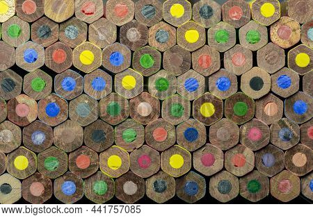 End View Of Wooden Colored Pencils. Colorful Pencils End. Macro. Close Up. Abstract. Background. Tex