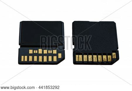 Macro Shot Of New Type Of Uhs Sd Card And Old Obsolete Slow Version, Which Is Outdated. Isolated On 