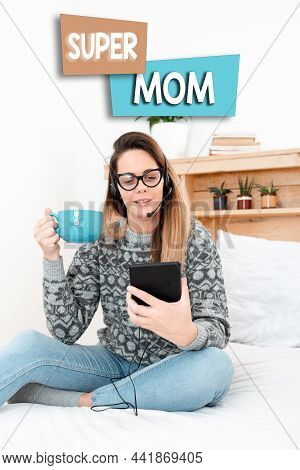 Conceptual Caption Super Mom. Word Written On A Mother Who Can Combine Childcare And Fulltime Employ