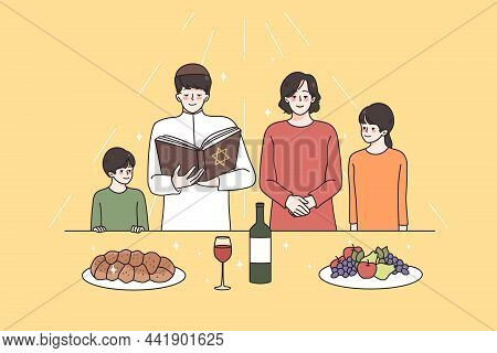 Religious Education And Spirituality Concept. Jew Family With Children Standing With Religion Book P