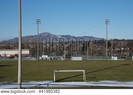 Soccer Stadium With The Mountain In The Background, Magog, Quebec, Canada, December 05 2021