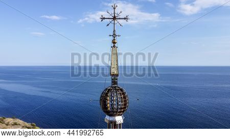 Malorechenskoye.crimea. September 14, 2021. Cross On The Spire Of The Church Of St. Nicholas Lightho