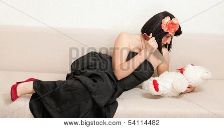 Gothic Woman Lying On The Sofa