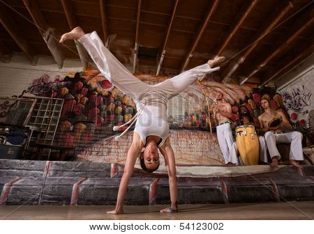 Woman In Split Handstand