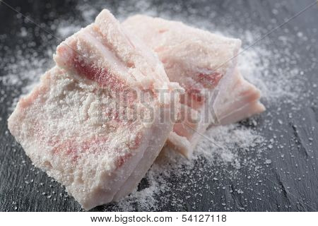 Salt lard on a slate surface