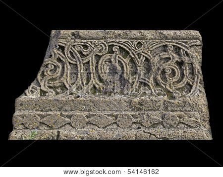 Fragment of a medieval armenian ornament isolated on black