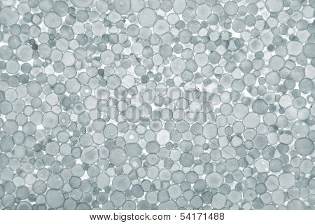 grey foam plastic closeup. Polystyrene foam texture