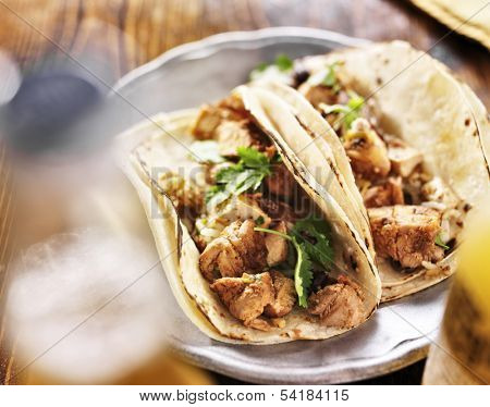 authentic mexican tacos with chicken and cilantro
