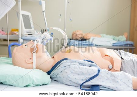 Medical dummies in hospital room