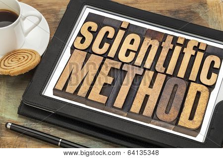 scientific method - science concept  text in vintage letterpress in wood type on a digital tablet
