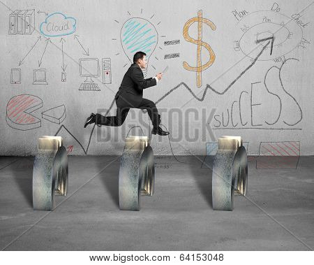 Jumping Over Euro Symbol With Business Doodles On Wall