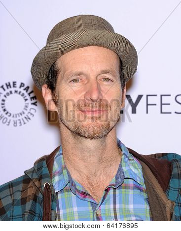 LOS ANGELES - MAR 28:  Denis O'Hare arrives to the Paleyfest 2014: American Horror Story COVEN  on March 28, 2014 in Hollywood, CA                