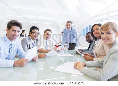 Group of Multi Ethnic Cheerful Corporate People Having a Business Meeting