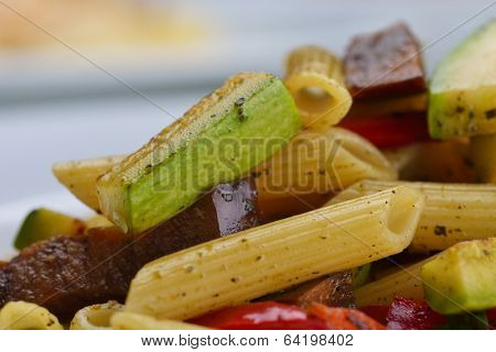 Pasta with shrimps, herbs and mashrooms isolated on white background in studio