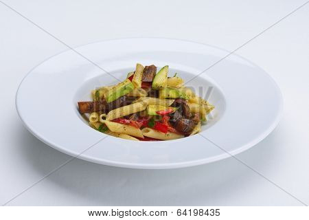 Pasta with shrimps, herbs and mashrooms isolated on white background in studio