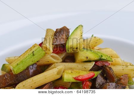Pasta with shrimps, herbs and mashrooms isolated on white background in studio