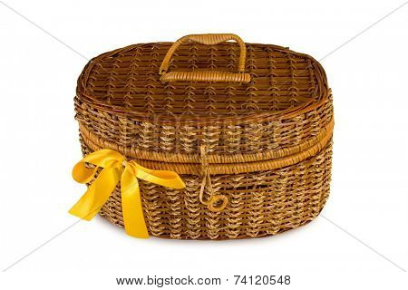 Basket with yellow bow, isolated on white, clipping path