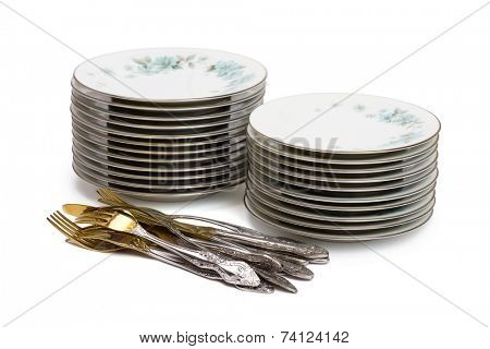 Stacks of dishware, isolated on white background