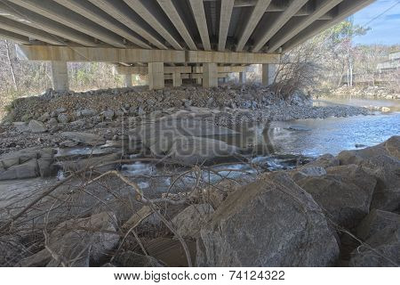 rocks under bridge