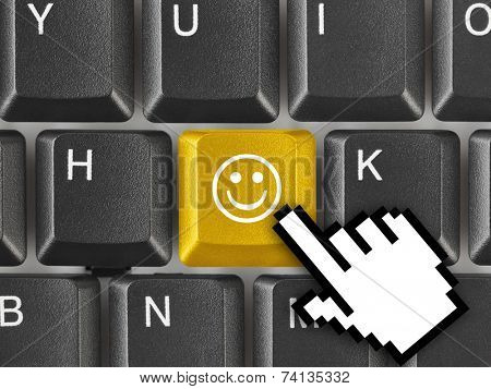 Computer keyboard with smile key - business concept