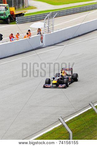 SEPANG, MALAYSIA - APRIL 8: Sebastian Vettel (team Red Bull Racing) at first practice on Formula 1 GP, April 8, 2011, Sepang, Malaysia