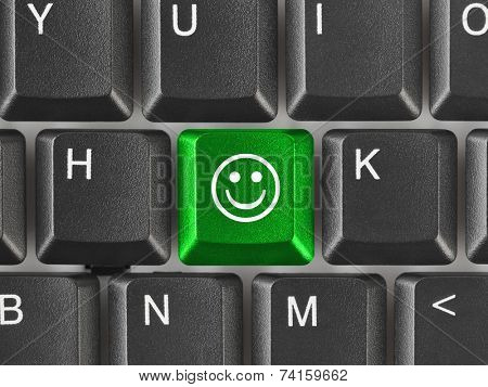 Computer keyboard with smile key - business concept