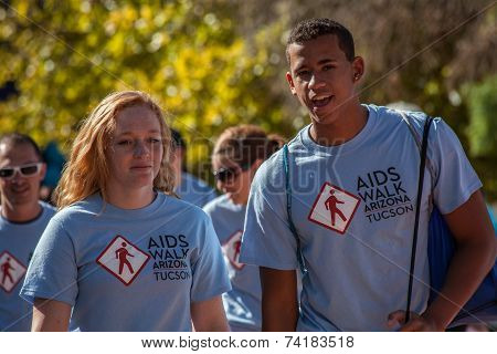 Two Young People At Aidswalk