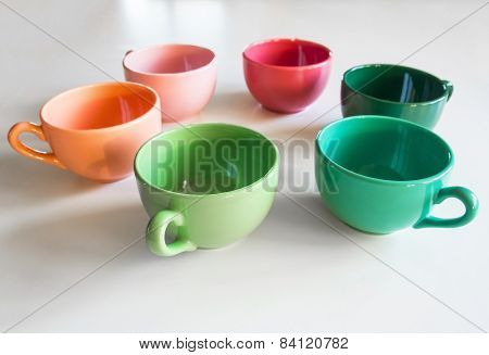 Colored Cup's On A White Table