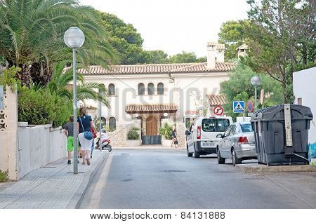 Street view with evening walkers