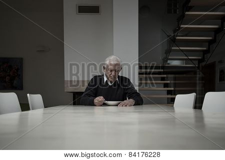 Elderly Man Eating Dinner