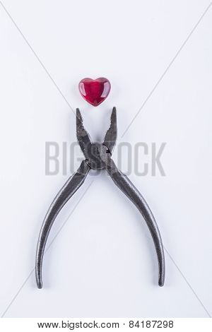 red glass heart on the white background