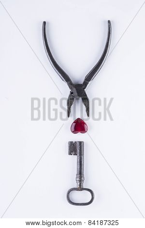red glass heart on the white background
