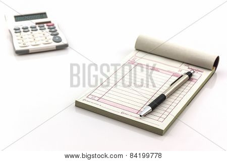 Invoice Book Which Open Blank Page With Pen And Calculator.