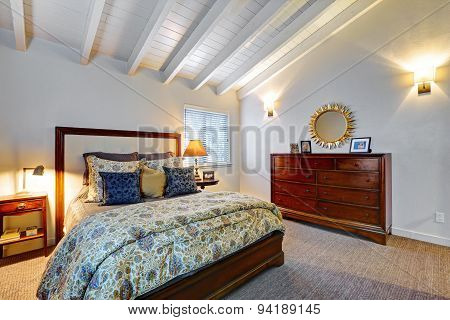 Elegant bedroom with grey walls.