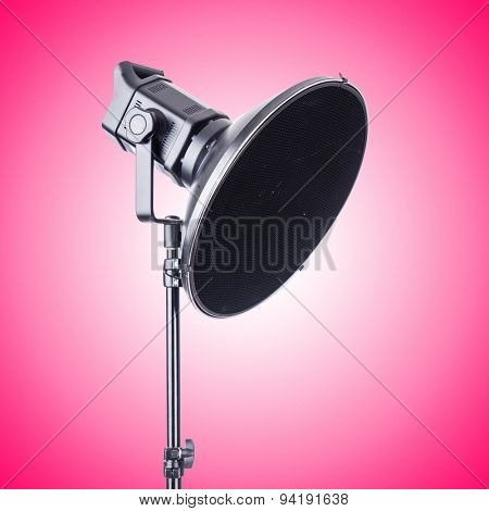 Studio light stand against the gradient