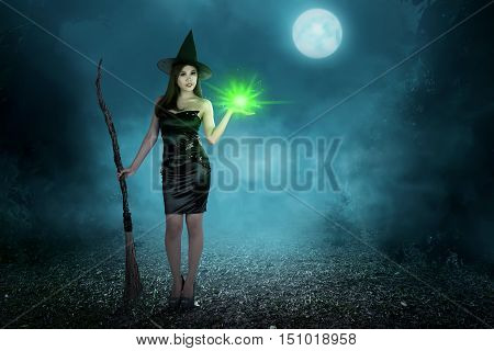 Beauty Asian Witch Woman With Magic Spell And Flying Broom