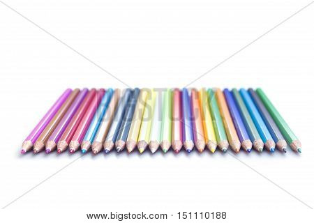 Strait Line of watercolor colored pencils isolated on white