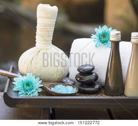 Spa massage compress balls, herbal ball on the wooden with treaments spa , Thailand, select focus