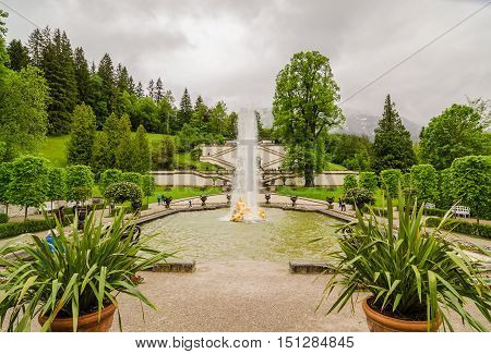 ETTAL GERMANY - JUNE 5 2016: Linderhof Palace and fountain group Flora and puttos in Bavaria Germany.