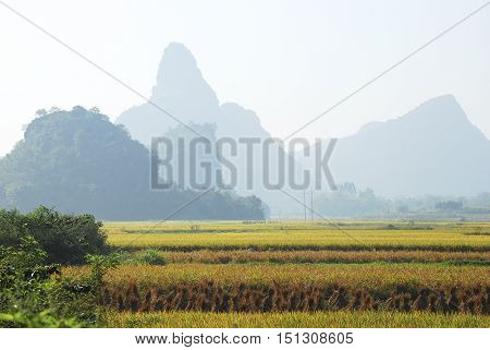 The karst mountains and rural scenery in autumn